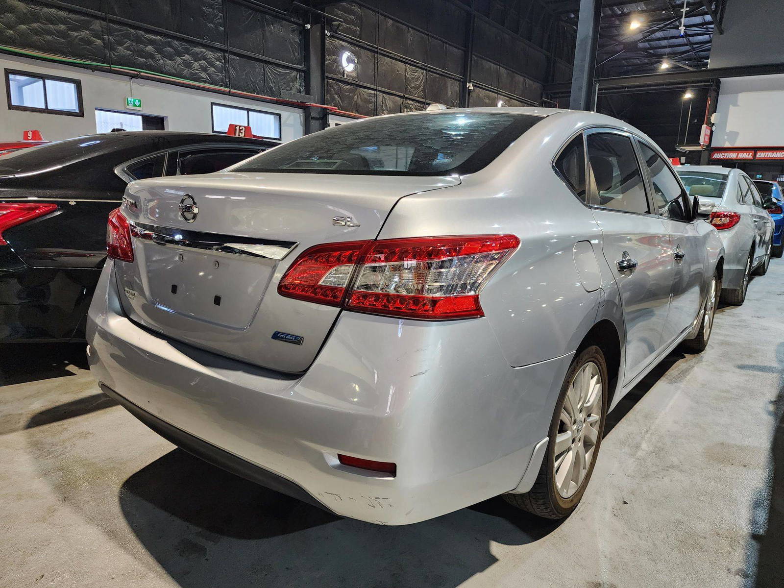 2013 NISSAN SENTRA — 199024 Miles — Lot 63294084 — Al Quoz - Marhaba Auctions Used Cars - Image 4