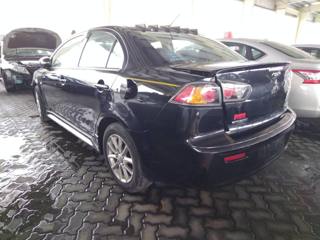2015 MITSUBISHI LANCER — 89465 Miles — Lot 77571813 - Marhaba Auctions Used Cars - Image 7