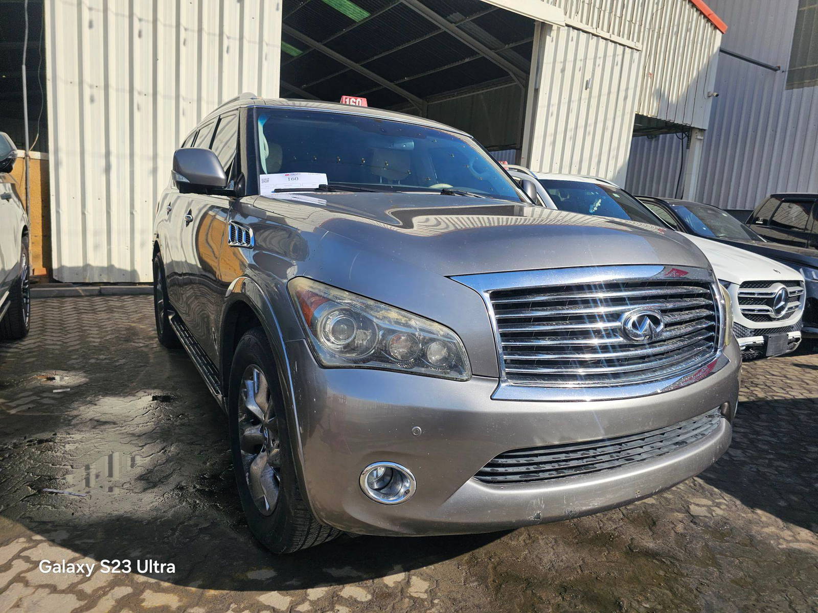 2012 INFINITI QX56 — 163769 Miles — Lot 43750966 — Main - Marhaba Auctions Used Cars - Image 3