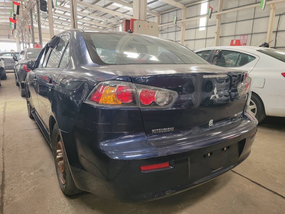 2013 MITSUBISHI LANCER — 179178 Miles — Lot 38705852 - Marhaba Auctions Used Cars - Image 9