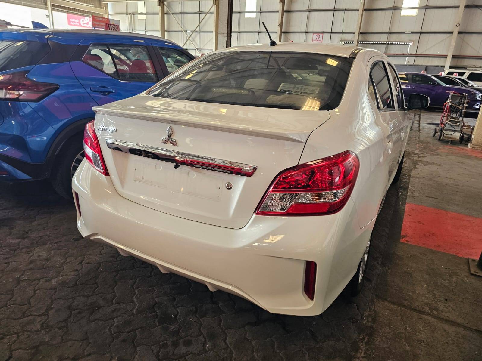 2023 MITSUBISHI ATTRAGE — sold — 105451 KM — Lot 000770 — Main - Marhaba Auctions Used Cars - Image 5