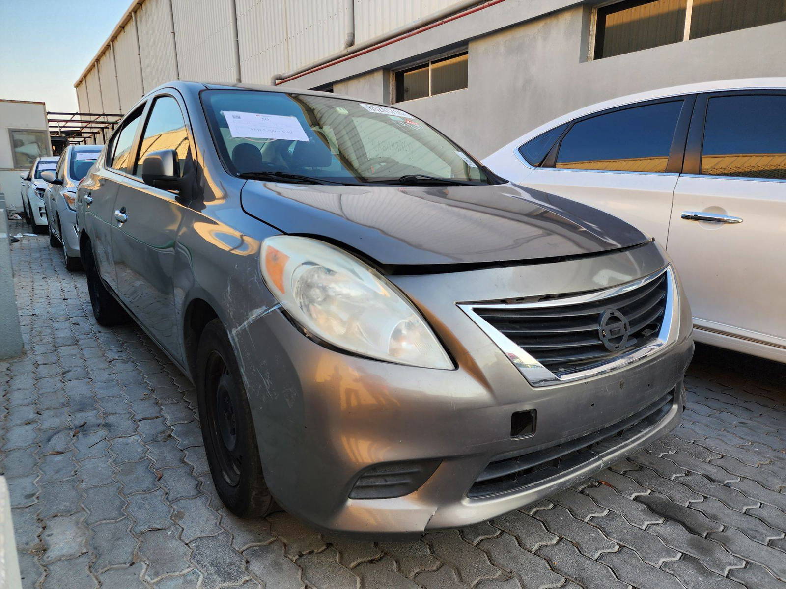2012 NISSAN VERSA — 176768 Miles — Lot 65241714 — Al Quoz - Marhaba Auctions Used Cars - Image 4