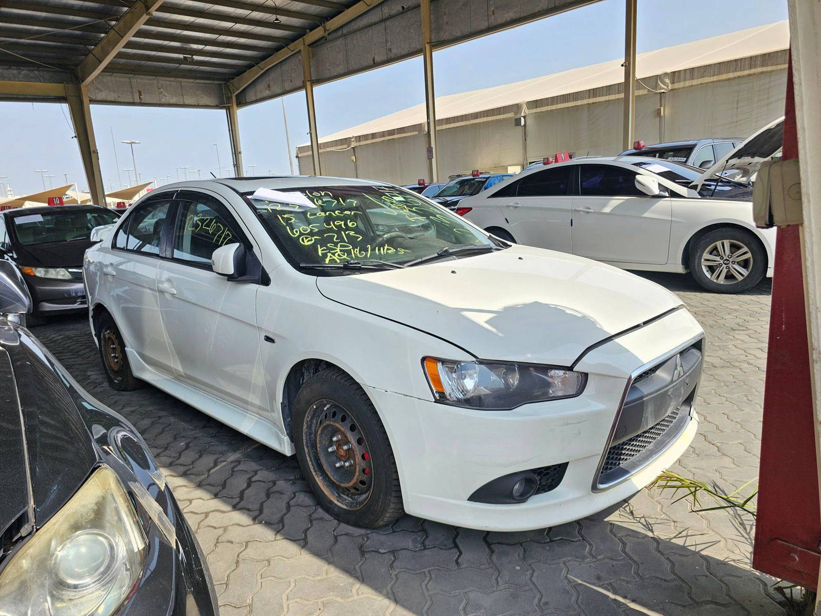 2015 MITSUBISHI LANCER — 213212 KM — Lot 12326717 — Souq - Marhaba Auctions Used Cars - Image 4