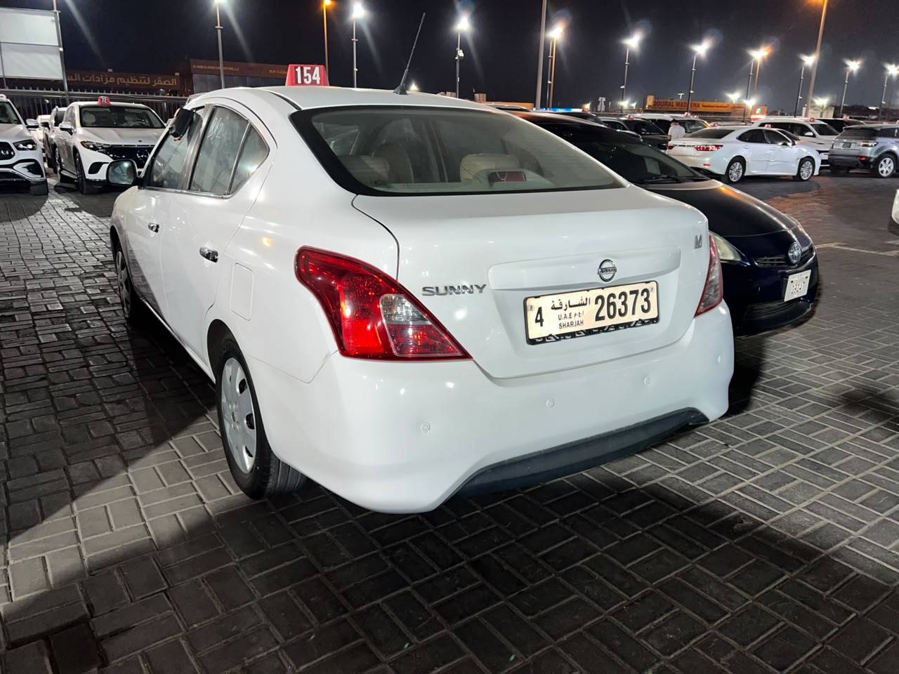 2021 NISSAN SUNNY — sold — 160272 KM — Lot AD0MG100729 — Al Sajaa - Marhaba Auctions Used Cars - Image 7