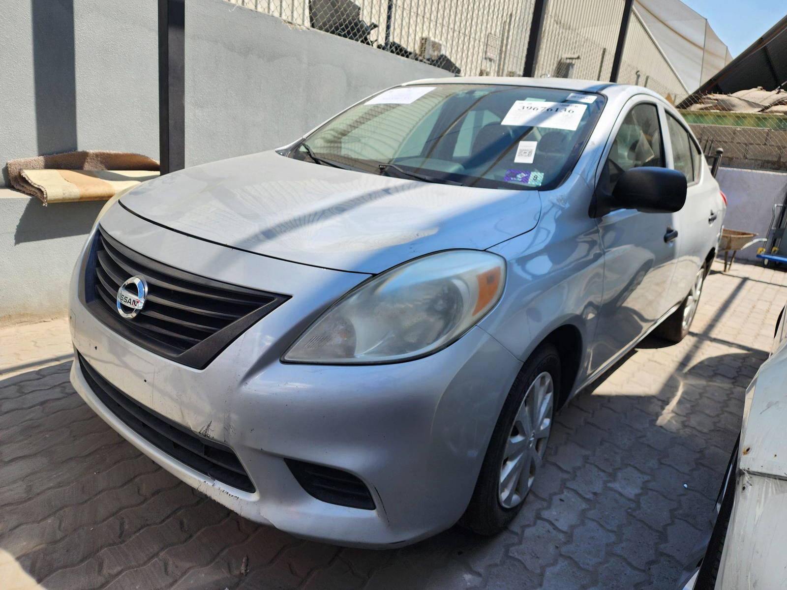 2012 NISSAN VERSA — 152847 Miles — Lot 18717 — Al Quoz - Marhaba Auctions Used Cars - Image 3