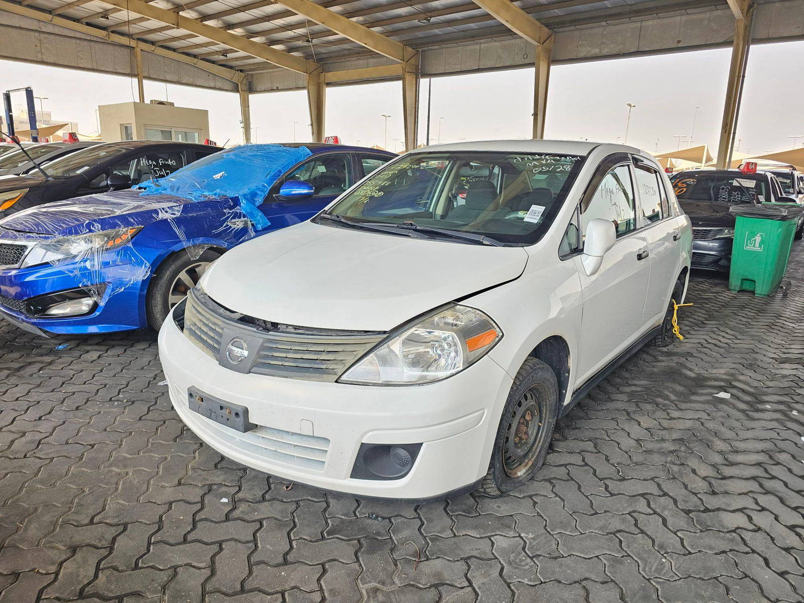 2010 NISSAN VERSA — 214363 KM — Lot 12332902 — Main - Marhaba Auctions Used Cars - Image 4