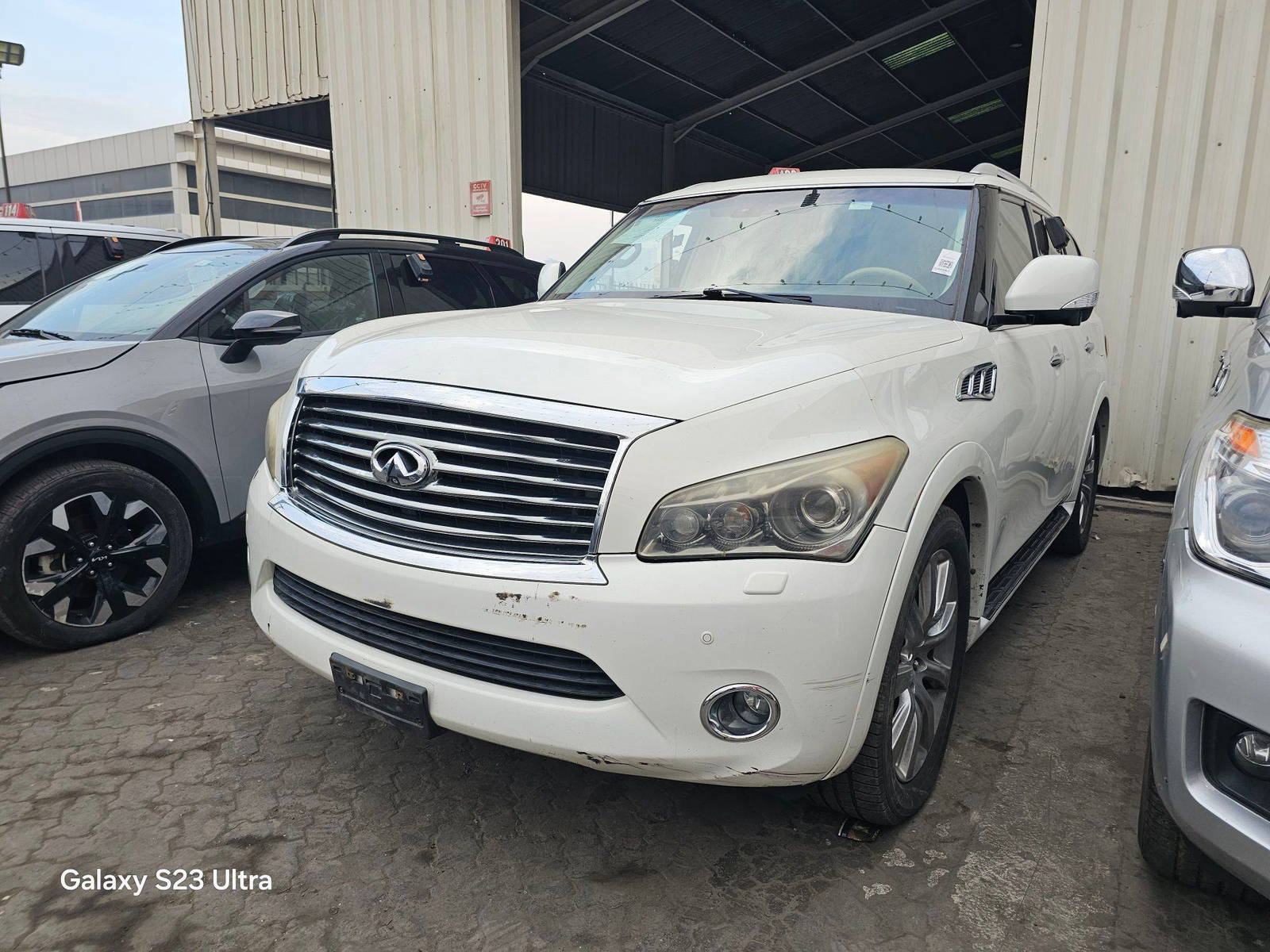 2012 INFINITI QX56 — 226822 Miles — Lot 7C9021040 — Main - Marhaba Auctions Used Cars - Image 3