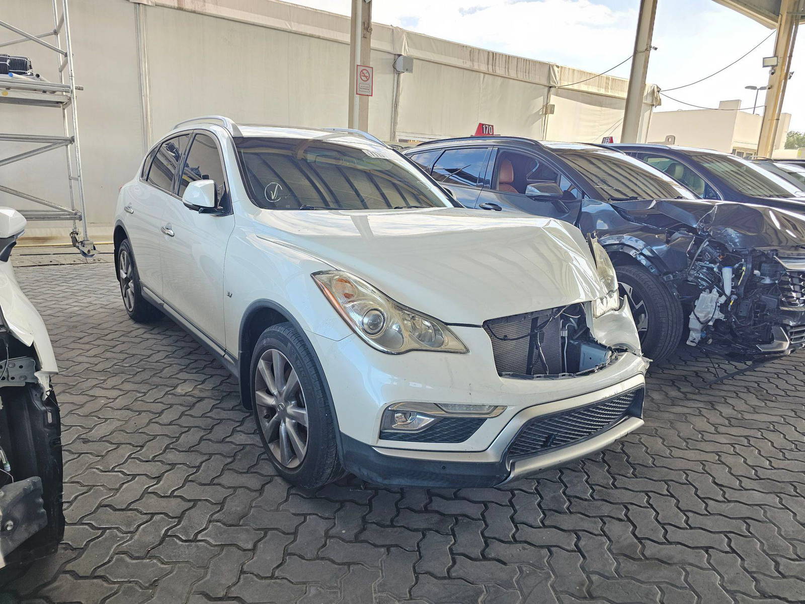 2017 INFINITI QX50 — 112404 Miles — Lot M416008 — Souq - Marhaba Auctions Used Cars - Image 4