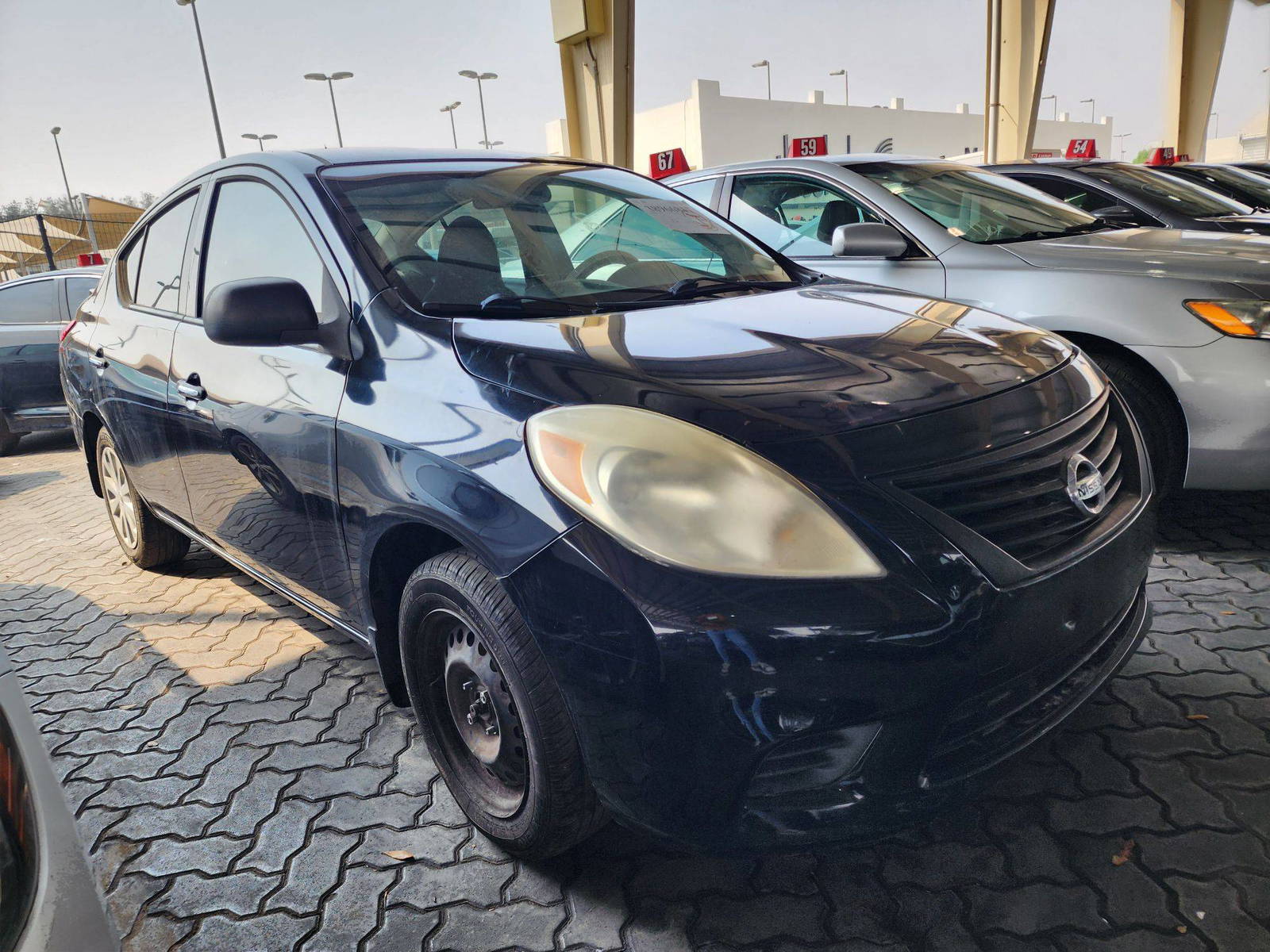 2014 NISSAN VERSA — 139640 Miles — Lot 62391 — Souq - Marhaba Auctions Used Cars - Image 5