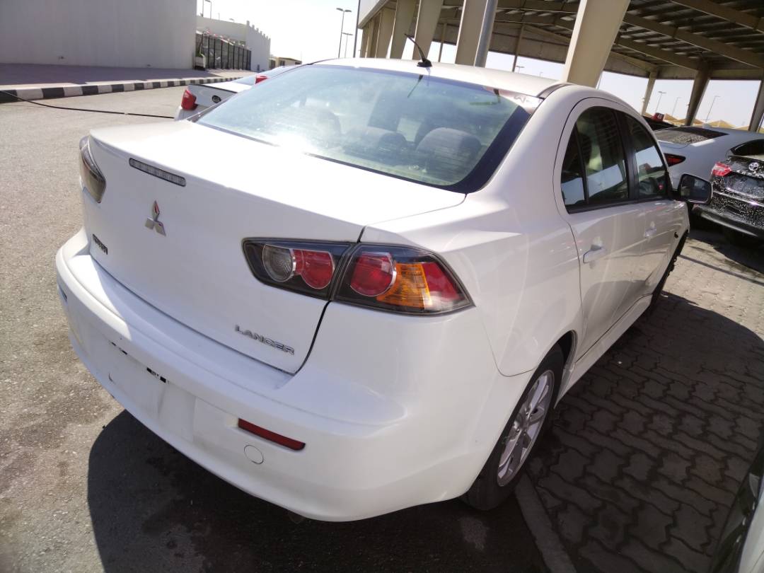 2011 MITSUBISHI LANCER — 156098 Miles — Lot 74107143 - Marhaba Auctions Used Cars - Image 9