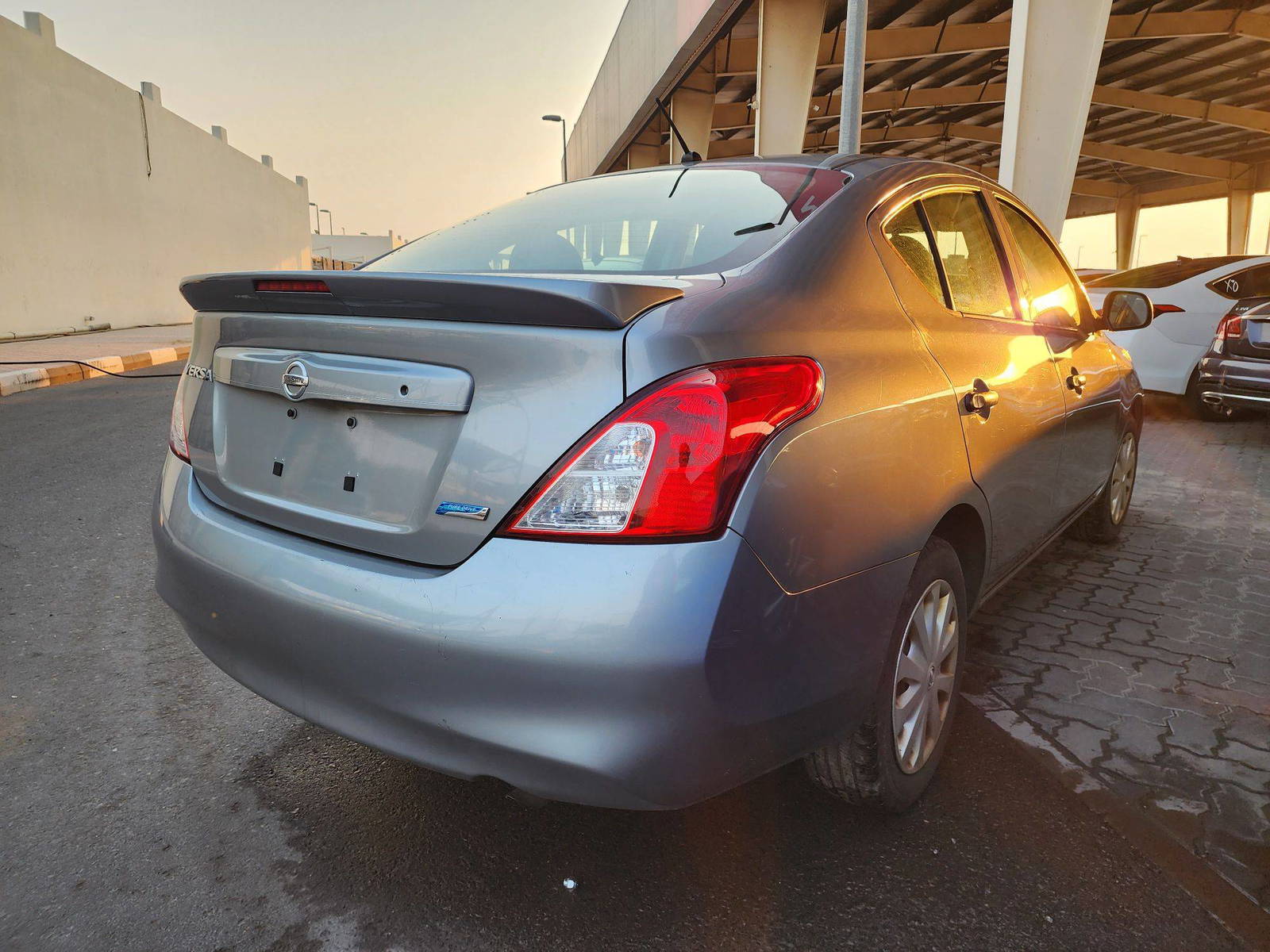 2013 NISSAN VERSA — 170221 Miles — Lot 39701930 — Souq - Marhaba Auctions Used Cars - Image 3