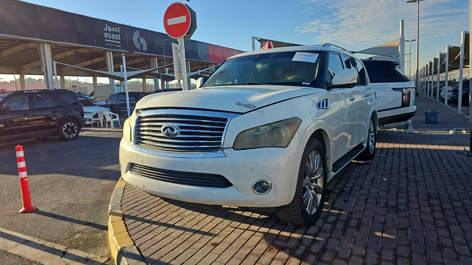 2013 INFINITI QX56 — 234885 Miles — Lot XD9550850 — Souq - Marhaba Auctions Used Cars - Image 12