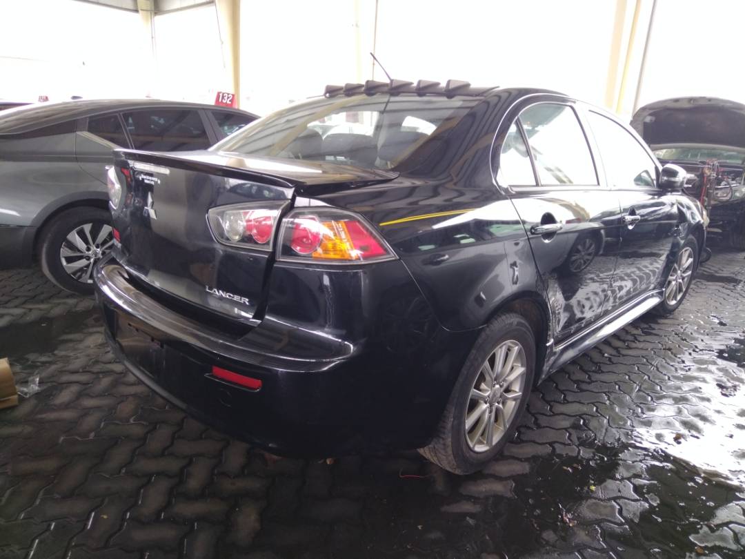 2015 MITSUBISHI LANCER — 89465 Miles — Lot 77571813 - Marhaba Auctions Used Cars - Image 6