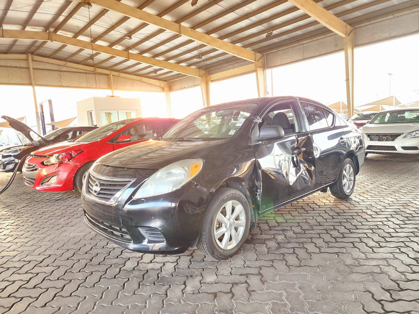 2013 NISSAN VERSA — 146040 Miles — Lot 215487 — Souq - Marhaba Auctions Used Cars - Image 4