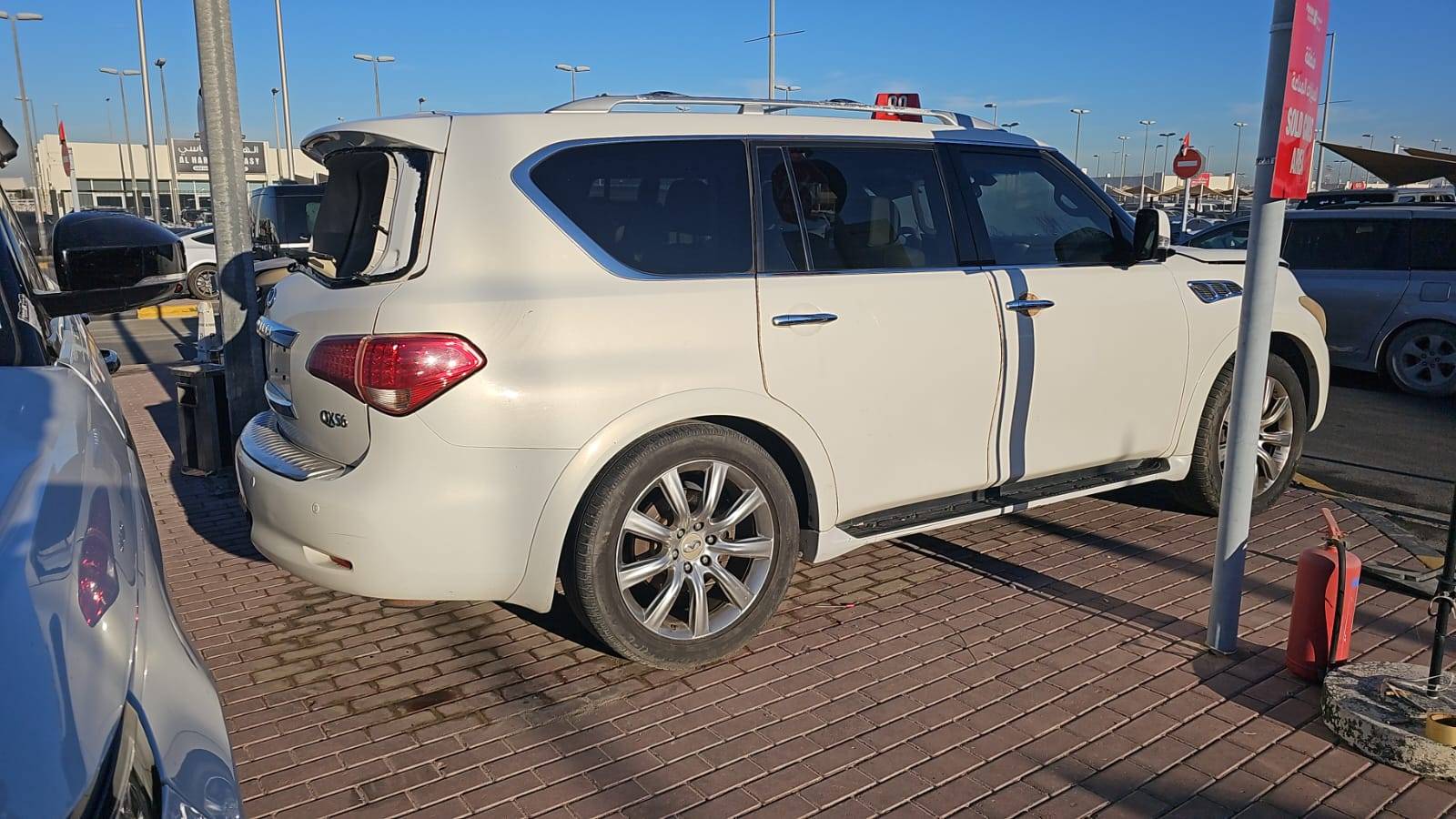 2013 INFINITI QX56 — 234885 Miles — Lot XD9550850 — Souq - Marhaba Auctions Used Cars - Image 10