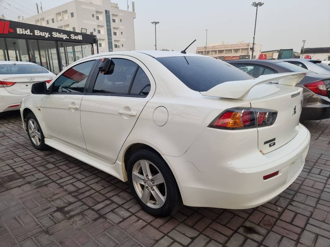 2013 MITSUBISHI LANCER — 137888 KM — Lot 600949 — Souq - Marhaba Auctions Used Cars - Image 5