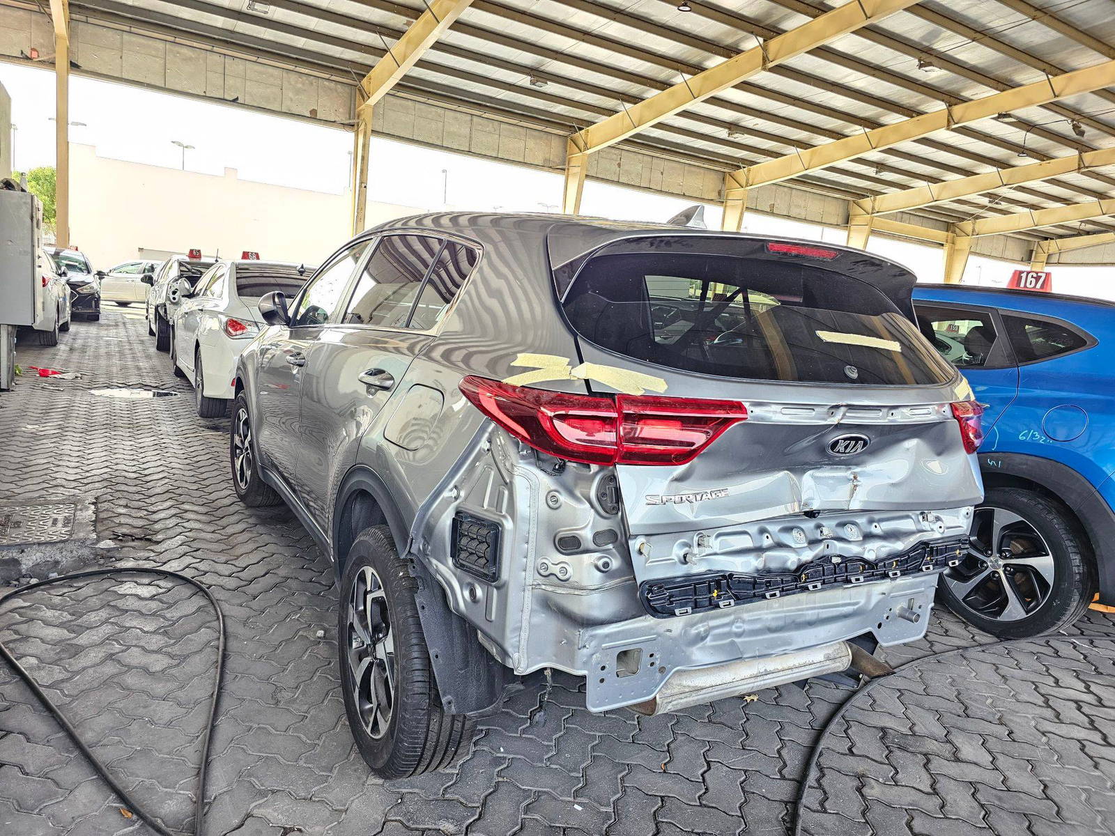 2020 KIA SPORTAGE — 104564 Miles — Lot 44717675 — Souq - Marhaba Auctions Used Cars - Image 5