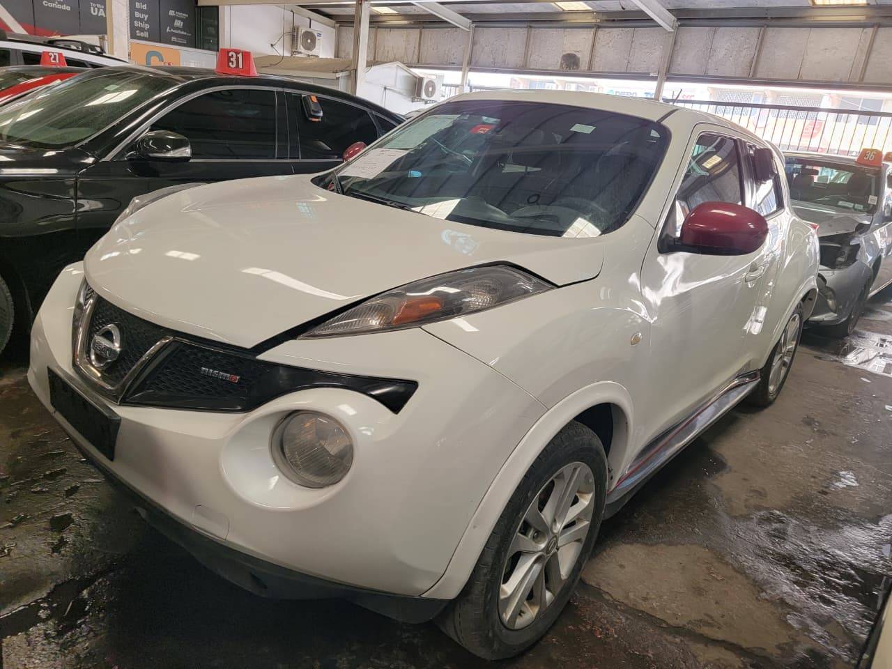 2014 NISSAN JUKE — 204949 KM — Lot ET365229 — Main - Marhaba Auctions Used Cars - Image 7