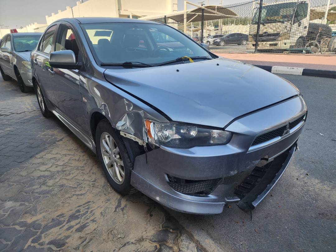 2014 MITSUBISHI LANCER — 170812 KM — Lot 604783 - Marhaba Auctions Used Cars - Image 7