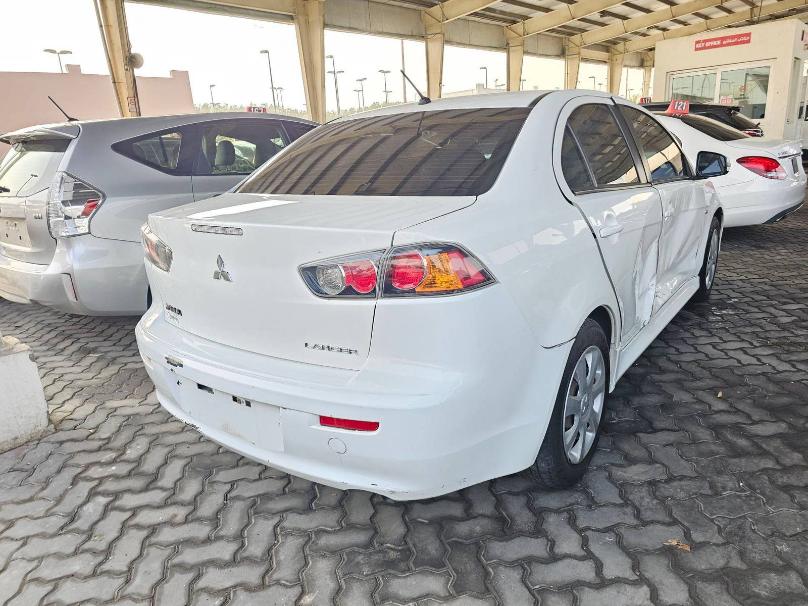 2015 MITSUBISHI LANCER — 169115 Miles — Lot 42883569 — Main - Marhaba Auctions Used Cars - Image 4