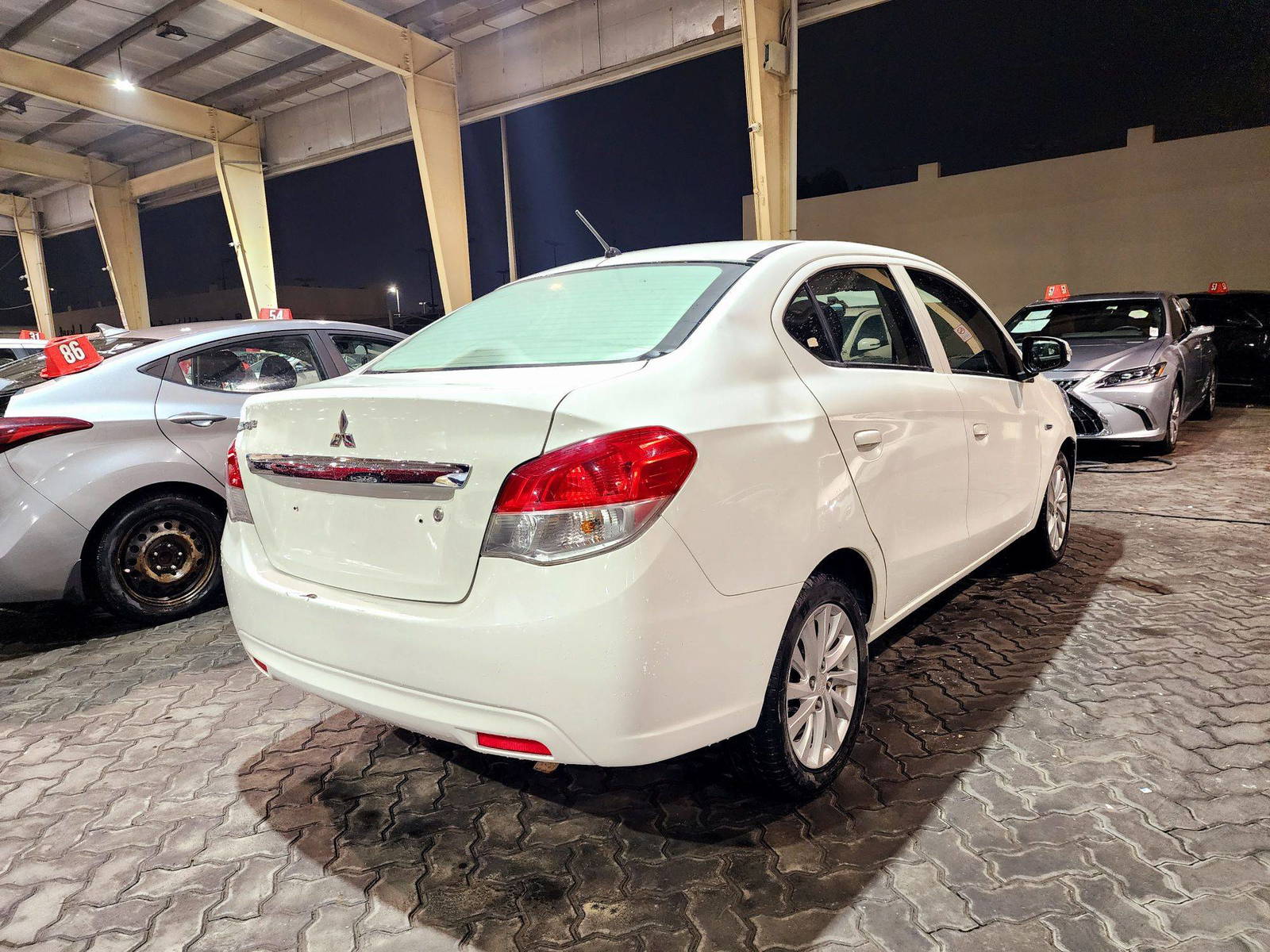 2019 MITSUBISHI ATTRAGE — 180160 KM — Lot J8KH006617 — Souq - Marhaba Auctions Used Cars - Image 4