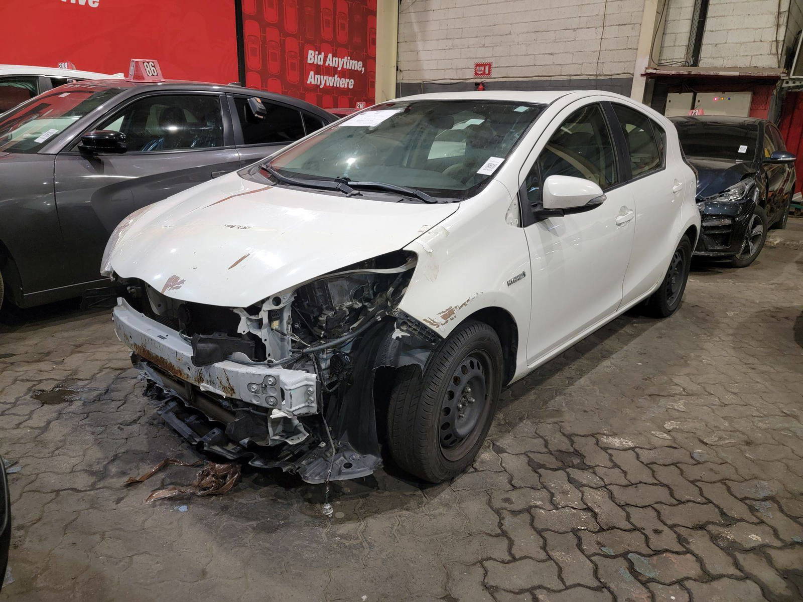 2015 TOYOTA PRIUS C — 303302 Miles — Lot 64455355 — Main - Marhaba Auctions Used Cars - Image 5
