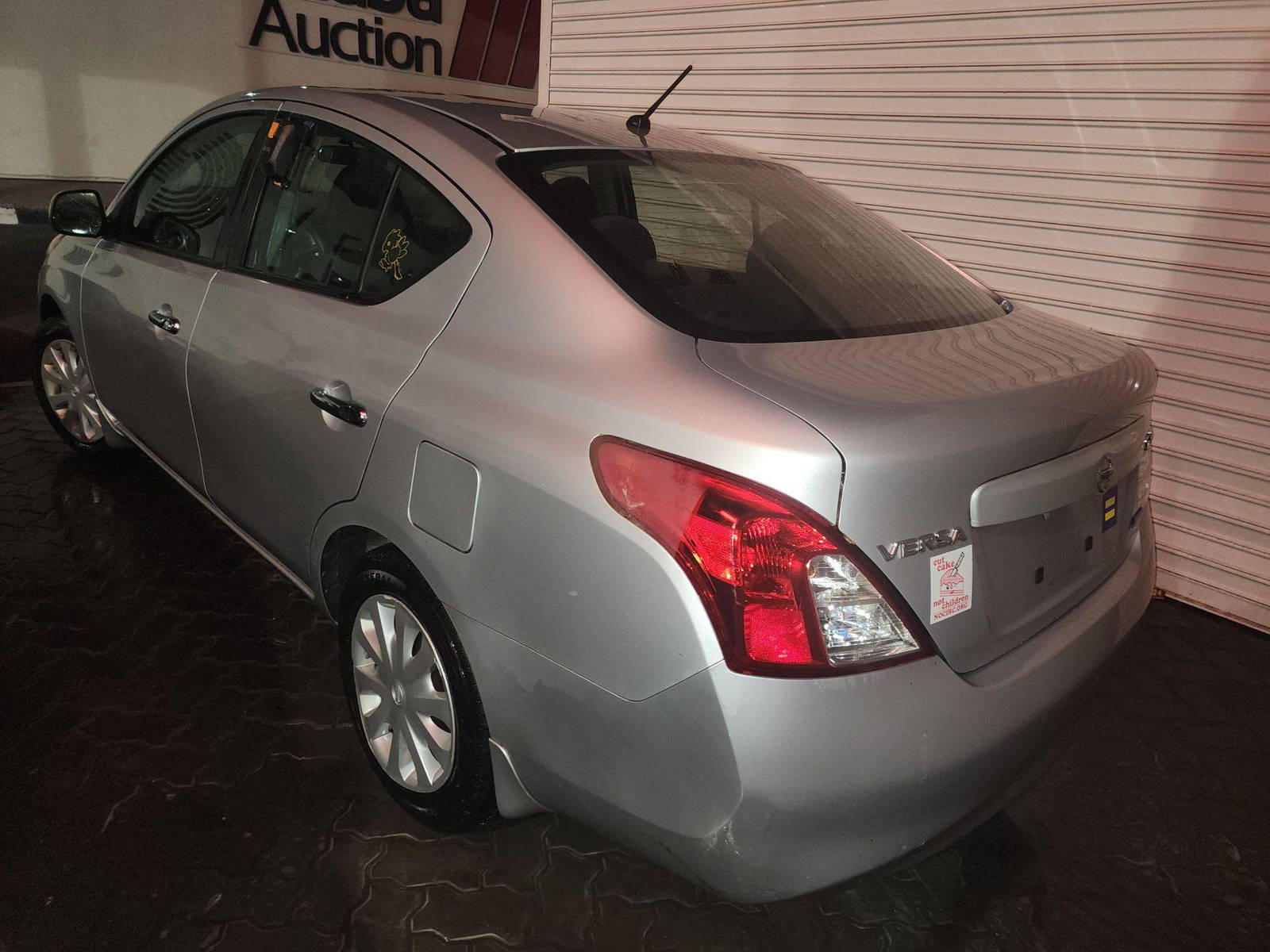 2012 NISSAN VERSA — 123493 Miles — Lot 38118356 - Marhaba Auctions Used Cars - Image 3