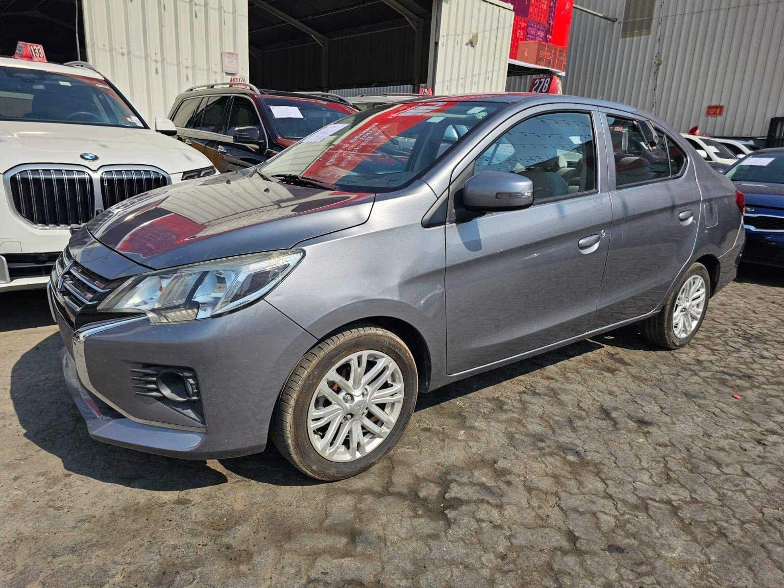 2022 MITSUBISHI ATTRAGE — sold — 131550 KM — Lot NH008233 — Main - Marhaba Auctions Used Cars - Image 2