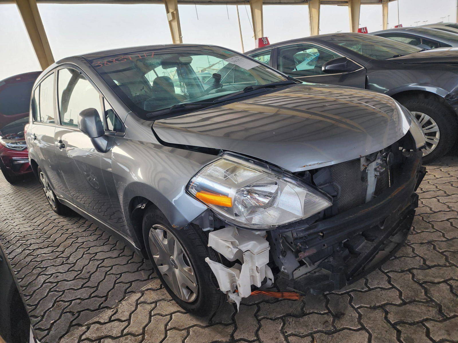 2012 NISSAN VERSA — 112976 Miles — Lot 38839717 — Souq - Marhaba Auctions Used Cars - Image 7