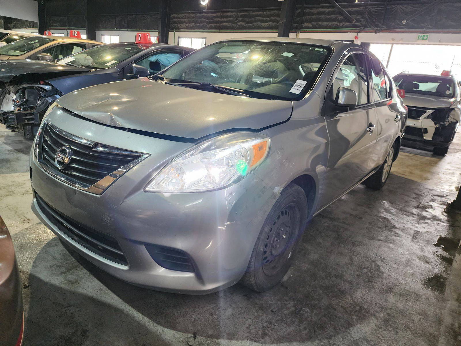 2014 NISSAN VERSA — 176212 KM — Lot 79535904 — Al Quoz - Marhaba Auctions Used Cars - Image 6