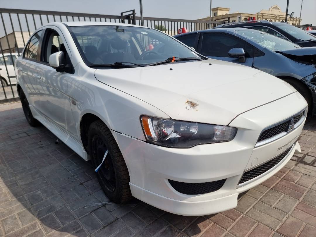 2014 MITSUBISHI LANCER — 213667 KM — Lot 604134 — Main - Marhaba Auctions Used Cars - Image 4