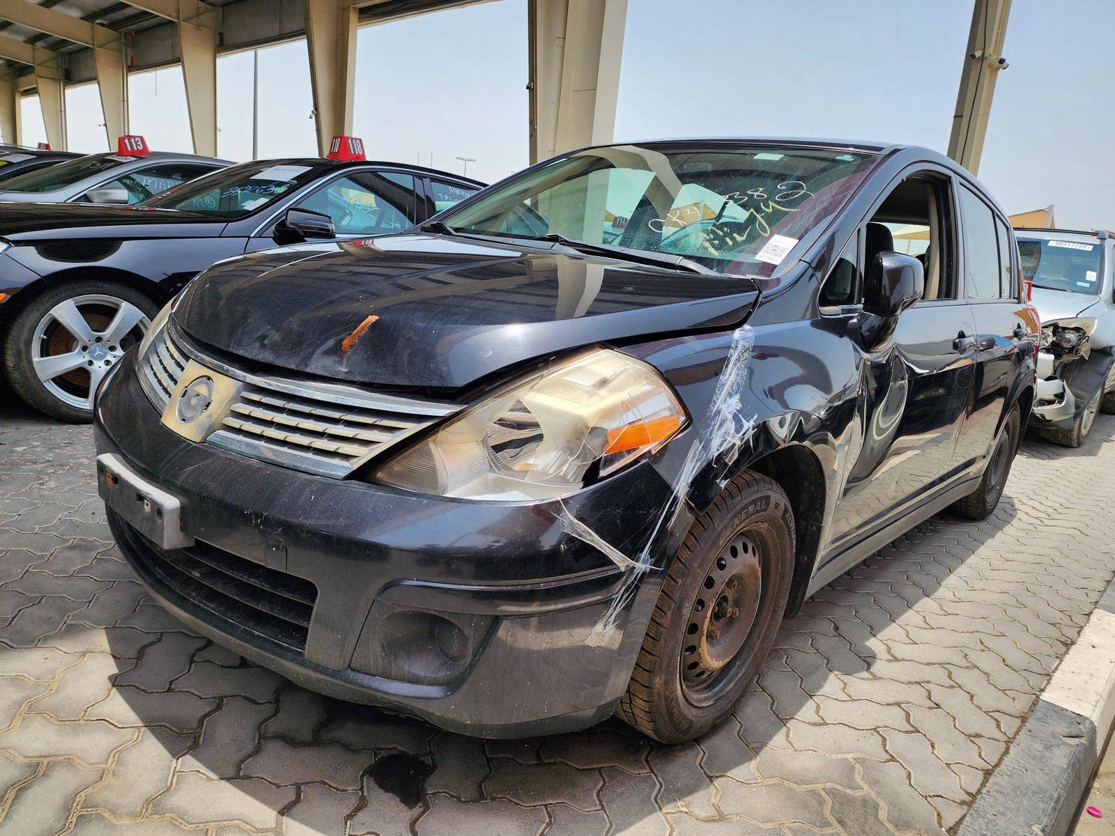 2009 NISSAN VERSA — 240347 KM — Lot 90976 — Main - Marhaba Auctions Used Cars - Image 7