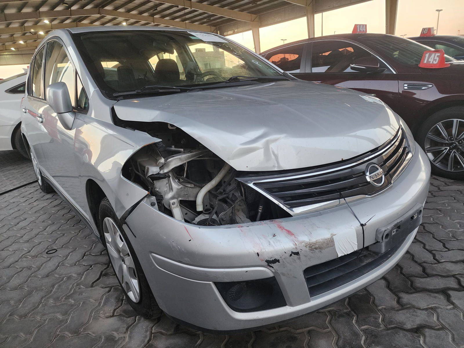 2012 NISSAN VERSA — 176681 Miles — Lot 37556422 - Marhaba Auctions Used Cars - Image 7