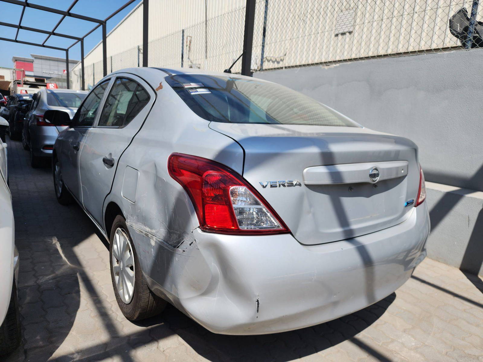 2012 NISSAN VERSA — 152847 Miles — Lot 18717 — Al Quoz - Marhaba Auctions Used Cars - Image 4