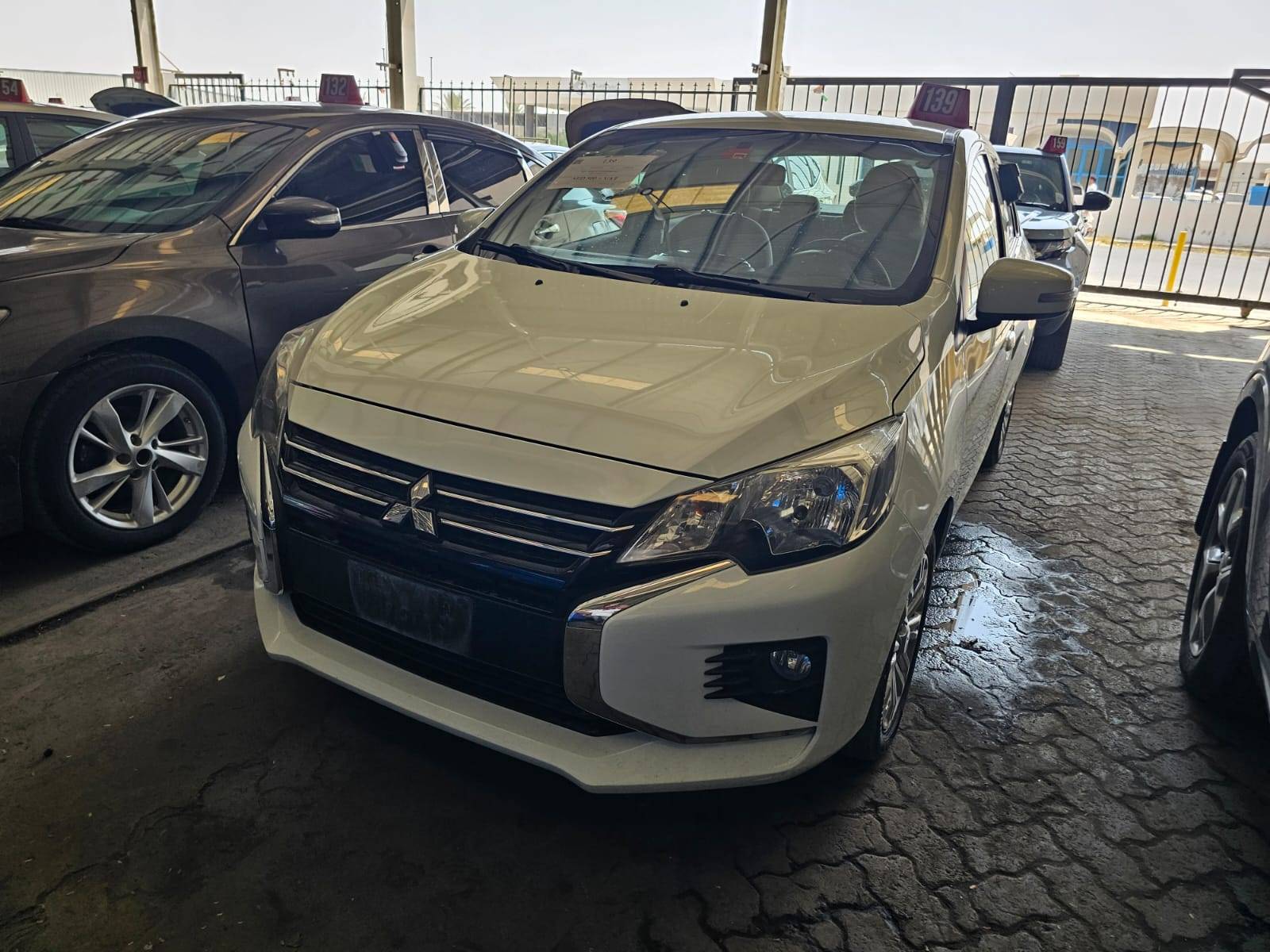 2022 MITSUBISHI ATTRAGE — sold — 87130 KM — Lot NH008145 — Main - Marhaba Auctions Used Cars - Image 2