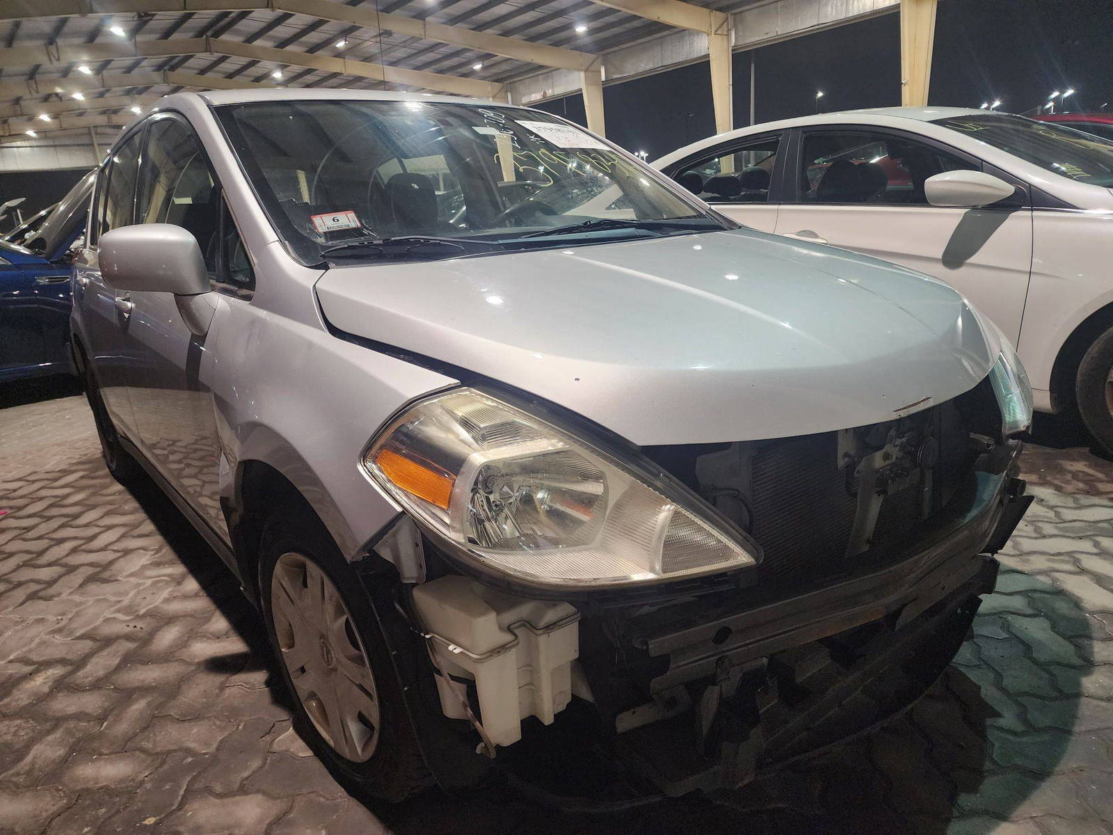 2012 NISSAN VERSA — 176234 Miles — Lot 37958342 - Marhaba Auctions Used Cars - Image 7