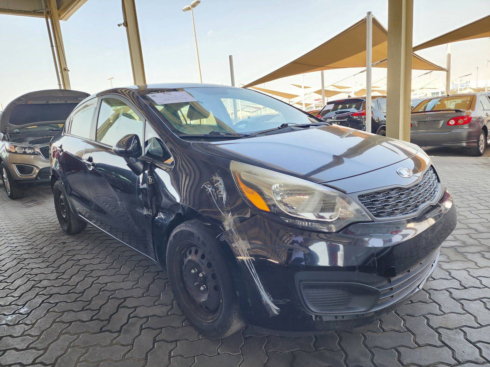 2014 KIA RIO — 170948 Miles — Lot 39747478 — Main - Marhaba Auctions Used Cars - Image 4