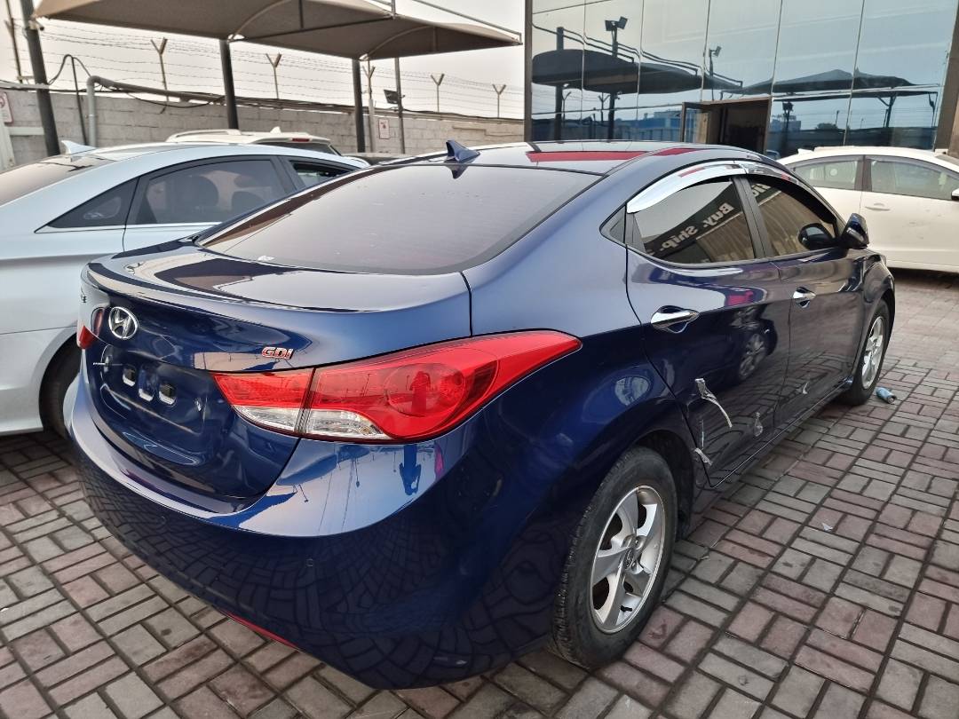 2013 HYUNDAI AVANTE — 154630 KM — Lot 124587 — Ind. 12 - Marhaba Auctions Used Cars - Image 4