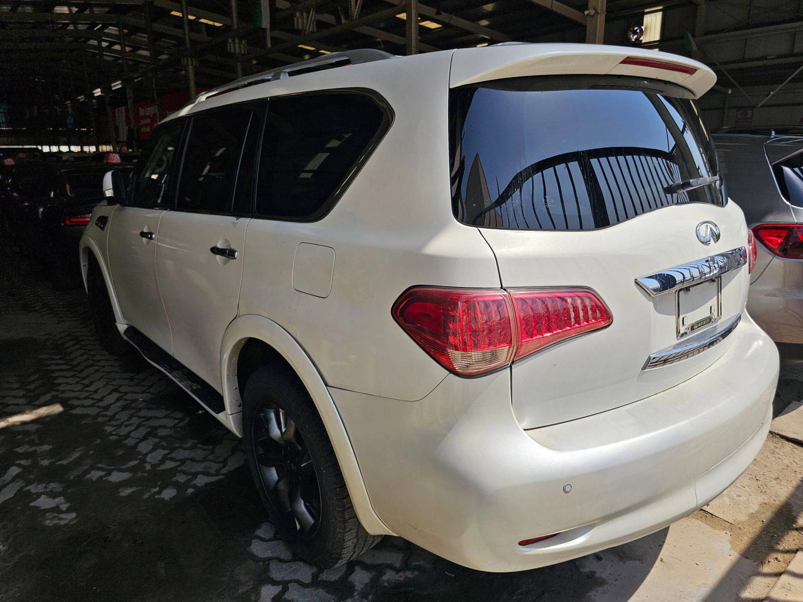 2011 INFINITI QX56 — 167591 Miles — Lot 43922342 — Main - Marhaba Auctions Used Cars - Image 6