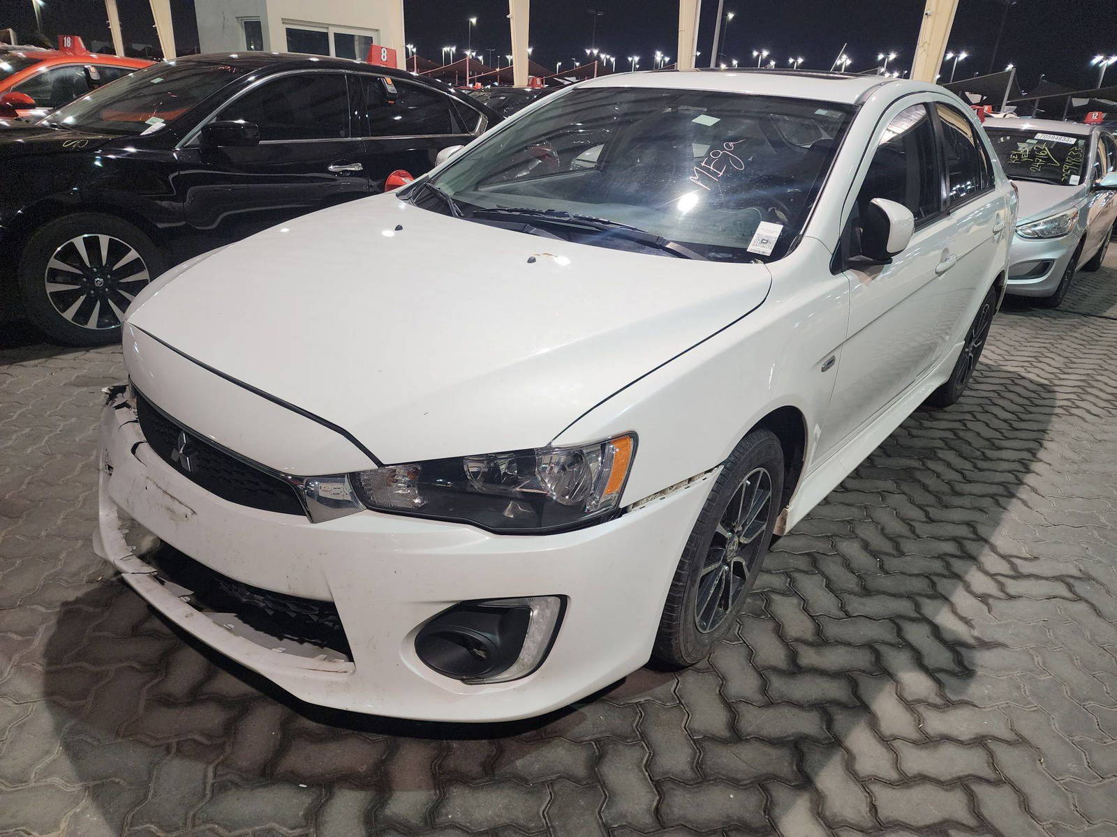 2016 MITSUBISHI LANCER — 183459 KM — Lot 18874 - Marhaba Auctions Used Cars - Image 9