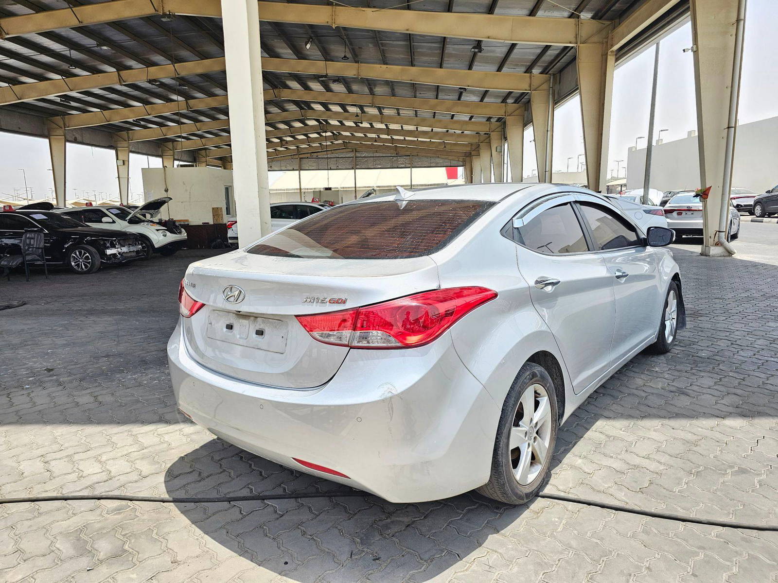 2011 HYUNDAI AVANTE — 80956 KM — Lot 92351 — Souq - Marhaba Auctions Used Cars - Image 4