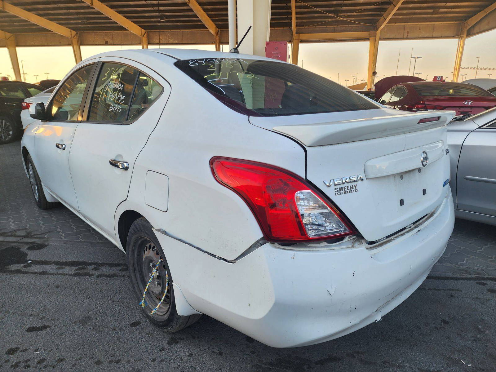2013 NISSAN VERSA — 153878 Miles — Lot 37694172 - Marhaba Auctions Used Cars - Image 11