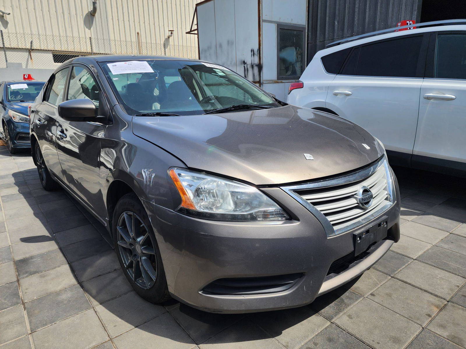 2015 NISSAN SENTRA — 252286 Miles — Lot 25994 — Al Quoz - Marhaba Auctions Used Cars - Image 4
