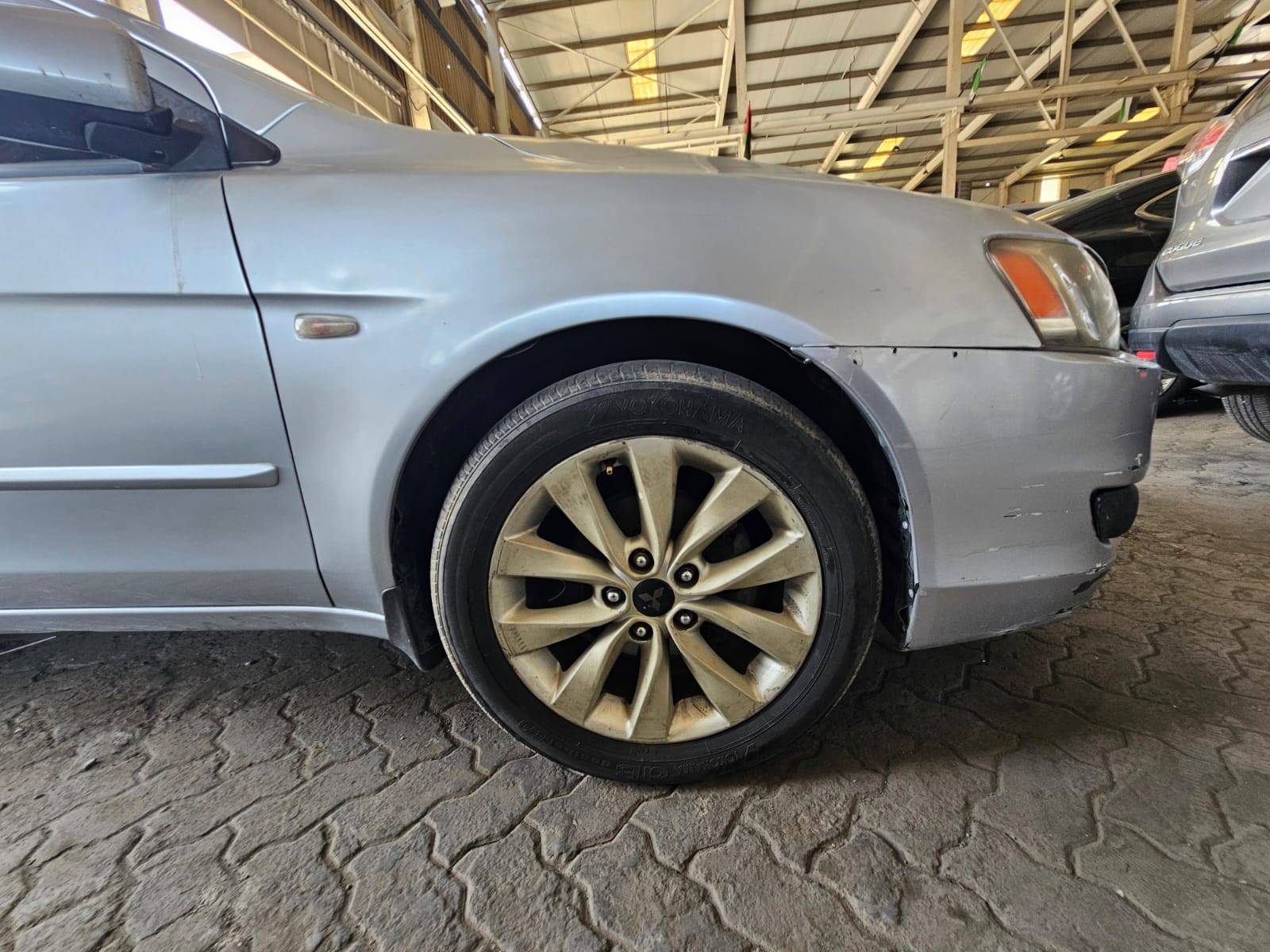 2009 MITSUBISHI LANCER — sold — 545599 KM — Lot U724282 — Main - Marhaba Auctions Used Cars - Image 12