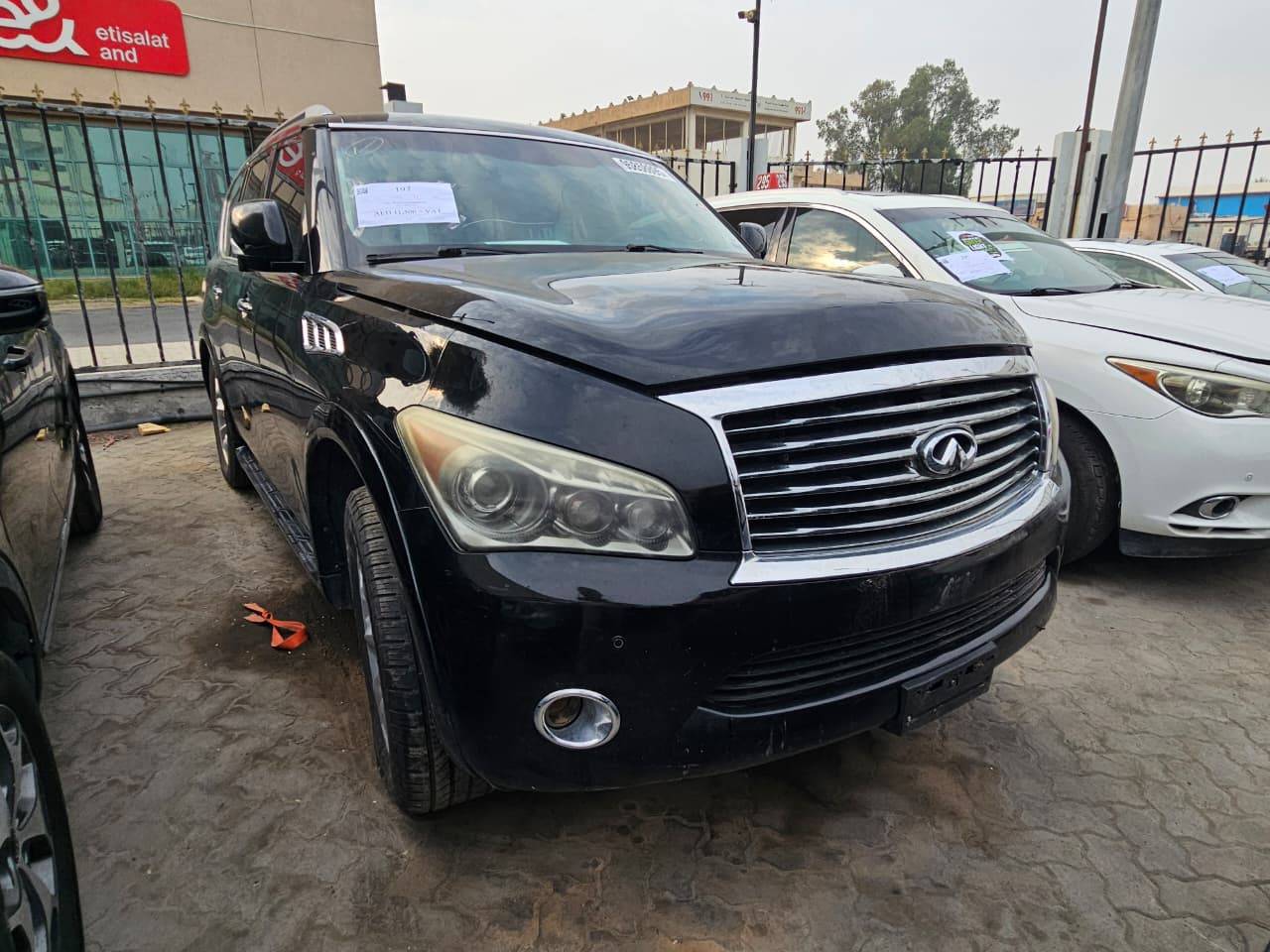 2011 INFINITI QX56 — 212670 Miles — Lot 9006013 — Main - Marhaba Auctions Used Cars - Image 4