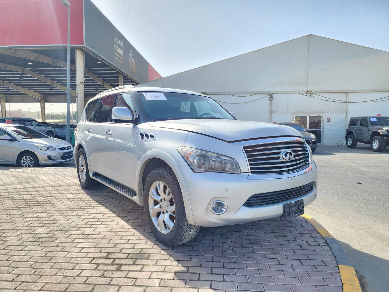 2012 INFINITI QX56 — 155685 Miles — Lot 1438487 — Souq - Marhaba Auctions Used Cars - Image 4
