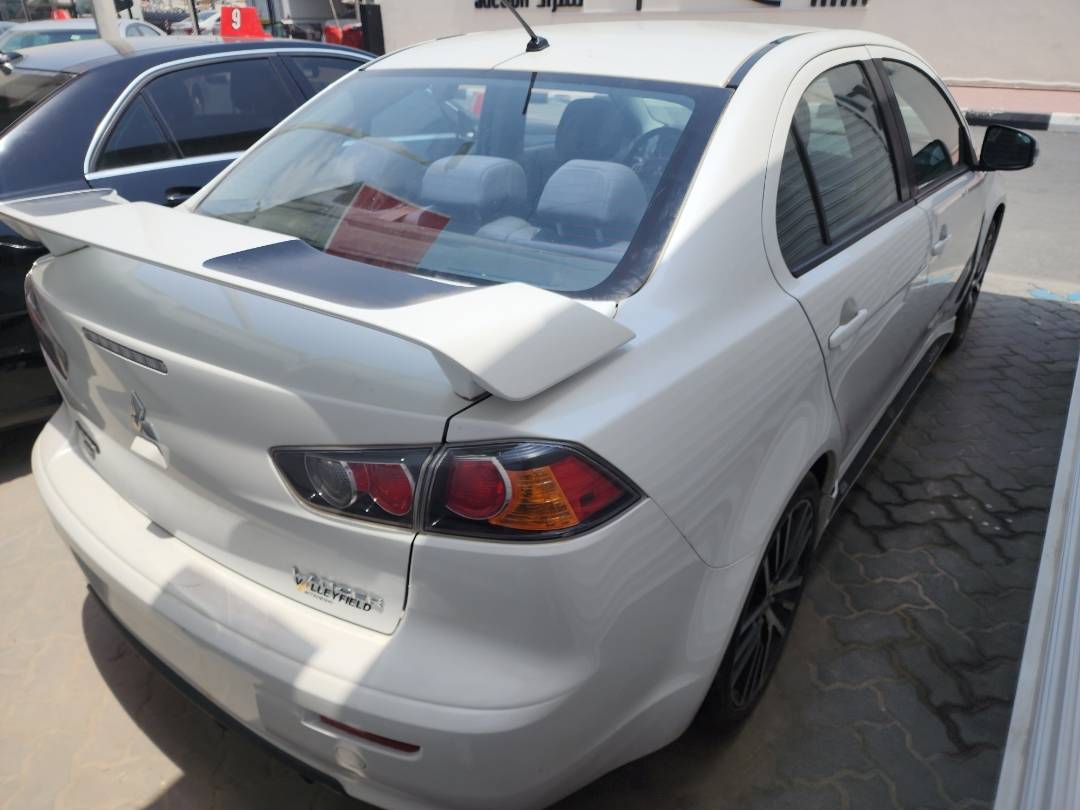 2016 MITSUBISHI LANCER — 235140 KM — Lot 78072643 - Marhaba Auctions Used Cars - Image 7