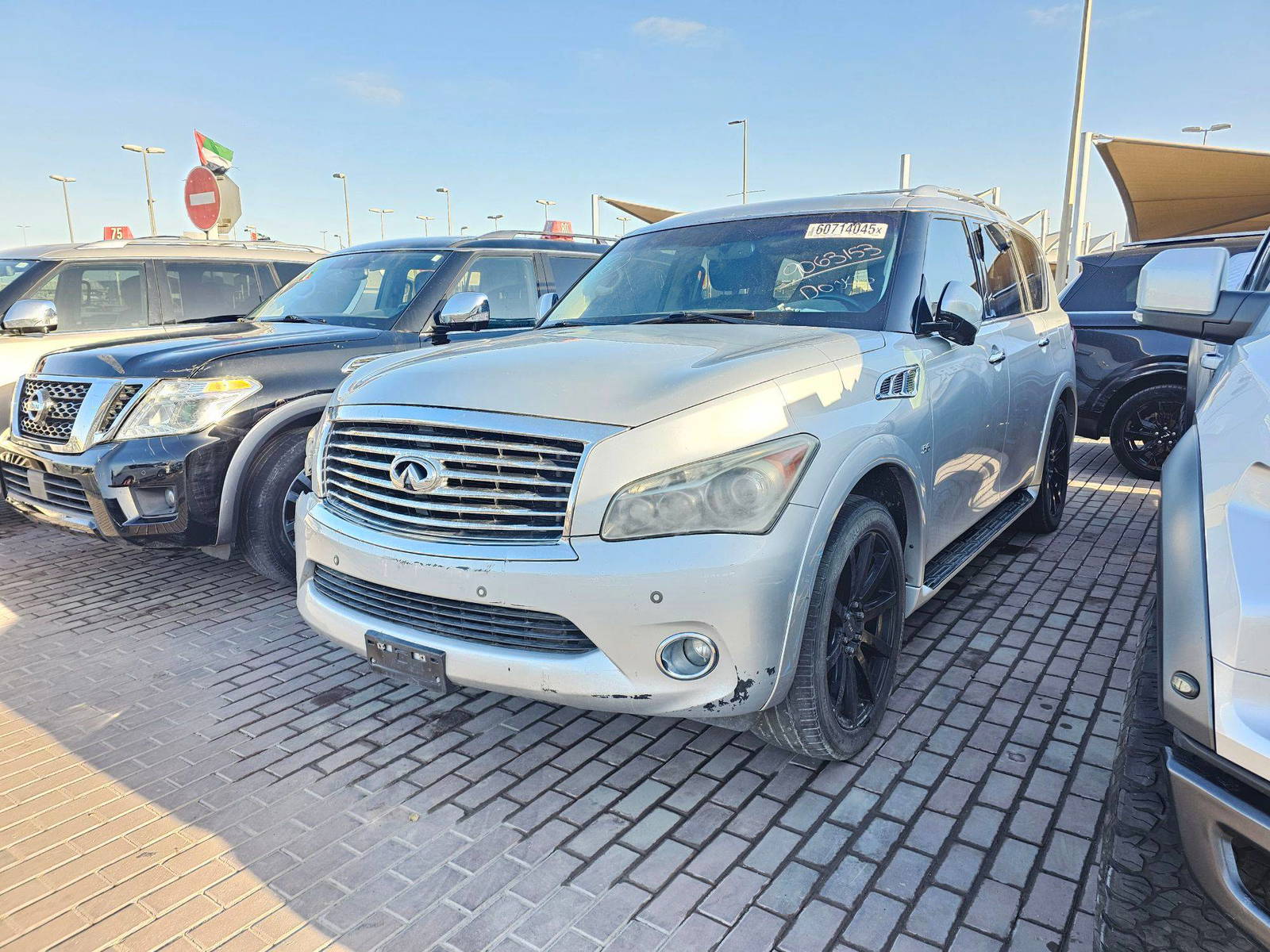 2014 INFINITI QX80 — 196354 Miles — Lot E6E9063153 — Souq - Marhaba Auctions Used Cars - Image 4