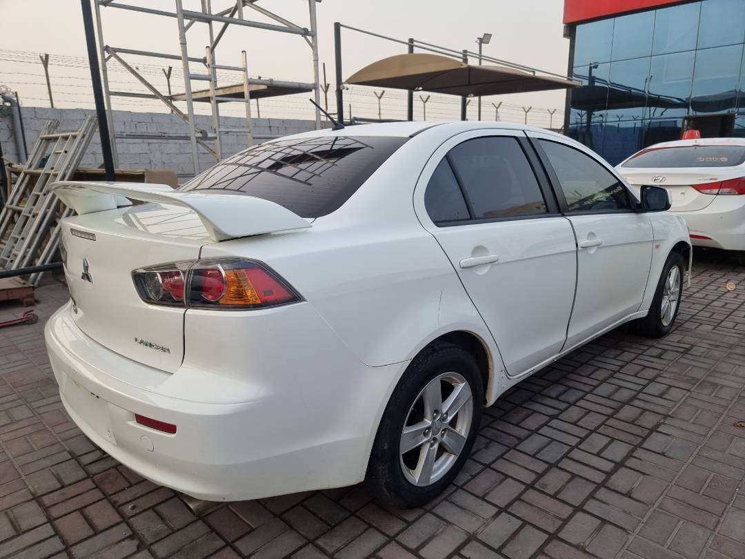 2013 MITSUBISHI LANCER — 137888 KM — Lot 600949 — Souq - Marhaba Auctions Used Cars - Image 4