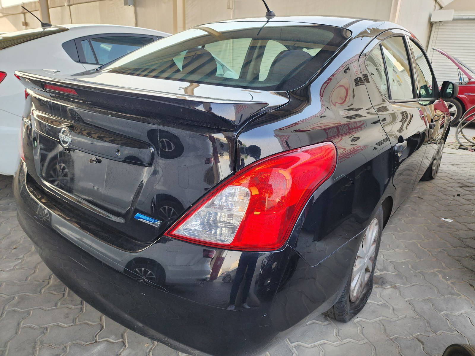 2014 NISSAN VERSA — 157791 Miles — Lot 39055487 — Souq - Marhaba Auctions Used Cars - Image 3